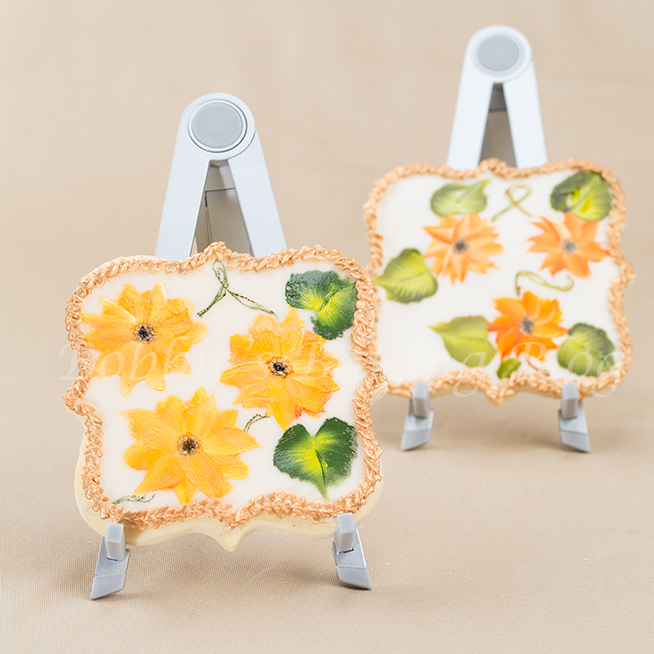 Learn how hand paint sunflowers on a sugar cookie: step by step donna dewberry style video 