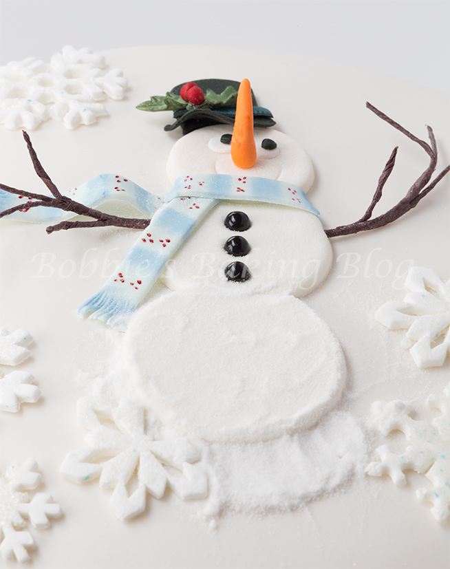 Learn how to create alan dunn's  sugar snowman cake 